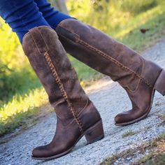 Lane Women's Plain Jane Boot LB0350A Lane's most loved tall boot, the Plain Jane. Made with distressed leather, let the soft, vintage classic brown leather do the talking. Decorated just enough with leather braiding along the collar and side seams. The 15-inch height makes them leggy, and the rounded toe is super comfortable. The Plain Jane will look great with your favorite skirt or dress for a fun night out on the town. There's nothing plain about this boot. Your new everyday favorite go-to bo Vintage Cowgirl Boots, Baby Cowboy Boots, Urban Cowgirl, Lane Boots, High Quality Boots, Plain Jane, Vintage Cowgirl, Cowgirl Chic, Zipper Heels