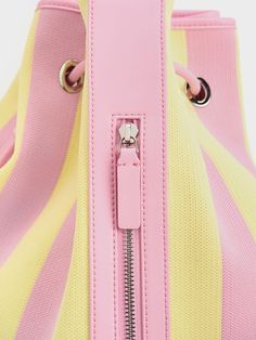 We have teamed up with Shanghai-based label Short Sentence to create a limited-edition collaborative capsule collection titled 'Riding On A Breezy Day'. Featuring colourful stripes, these eye-catching pieces are everyday essentials that are designed for urban utility. Big bags are back, and this limited-edition bucket bag in vibrant yellow-and-pink is certainly worthy of a spot in your wardrobe. Featuring an extra-large interior, this capacious carry-all is generously sized to hold your everyday essentials and more, yet it is still lightweight enough to be your go-to bag. Great for both daily commutes and vacations, this bag prioritises functionality -- it comes with a thick, shoulder strap that ensures carrying comfort for all-day use, while also being adjustable to best suit your prefere Platform Mary Janes, Charts For Kids, Size Chart For Kids, Charles Keith, Big Bags, Capsule Collection, Everyday Essentials, Belt Size, Shanghai