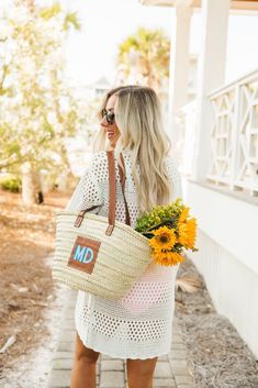 This handwoven straw tote will be your beach go-to this summer! Customize the leather patch with a monogram in your favorite colors and enjoy easy access with the open top design. 
Details:

Materials: Straw & PU Leather


Handwoven in Morocco

15.7" x 10"
Long leather handle - the perfect length to fit over your arm!

Color may slightly vary due to natural material


Please enter the letters for the monogram in the EXACT order that you want them to appear. Summer Straw Bag With Woven Leather, Spring Beach Bag In Woven Leather Tote, Spring Woven Leather Beach Tote Bag, Rectangular Woven Leather Beach Bag For Spring, Spring Rectangular Woven Leather Beach Bag, Summer Beach Bags With Woven Leather, Summer Beach Straw Bag With Woven Leather, Summer Beach Bag With Woven Leather For Spring, Spring Beach Bag With Woven Leather