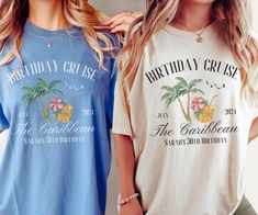 two women standing next to each other in front of a white wall wearing birthday cruise shirts