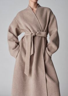 Full length coat in luxurious double faced wool cashmere. Tonal taupe contrast. Self Belt. Side seam pockets. 90% Wool, 10% Cashmere Full Length Coat, Beige Coat, Wrap Coat, Womens Cashmere, Maternity Shops, Loungewear Shorts, Designer Clothes For Men, Modern Outfits, Toddler Girl Outfits