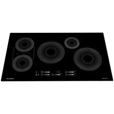 a black stove top with four burners on the front and two in the back