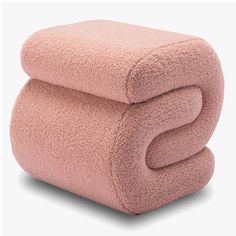 two pink towels stacked on top of each other in front of a white background,