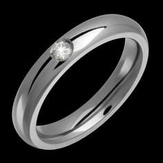 a white gold ring with a diamond on the center and two thin bands around it