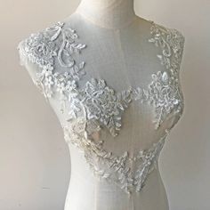 "Vintage Off White Floral Lace Applique Trims Materials Sequin Embroidery Flower Lace Patch Sewing on Bridal Wedding Dress Gown 1 Pair Size: 20 cm x 40 cm (7.9\" x 15.7\") Color: Off White This listing is for 1 pair, more in stock. We offer special discounts for designers and wholesale orders! You can choose a express shipping here: https://www.etsy.com/listing/602095820/express-shipping-charge?ref=shop_home_active_8 Please send us your phone number if you choose express delivery. Any problem, p Wedding Gown With Floral Applique And Fitted Bodice, White Sleeveless Lace Bodice, Wedding Gown With Embroidered Fitted Bodice, Sleeveless Wedding Gown With Floral Applique, Fitted Lace Work Wedding Dress For Bride, Fitted Lace Wedding Dress For Bride, Fitted Floral Embroidered Lace For Wedding, Fitted White Gown With Floral Embroidery, Fitted Lace Gown With Embroidery