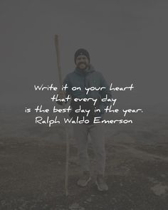 a man standing on top of a hill holding a ski pole with the words write on your heart that every day is the best day in the year