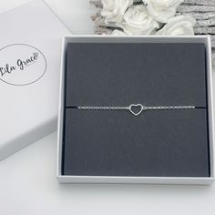 "A sterling silver bracelet with heart link available in a range of bracelet sizes including a Multi Size option that is fully adjustable and will fit most adults. The bracelet comes attached to a jewellery card in a resealable clear bag and you have the option to add a jewellery box, perfect if its a gift.   WHAT YOU GET - 1 x Bracelet - Sterling silver chain with sterling silver link 10mm heart - Jewellery Card and Resealable Clear Bag Optional Lila Grace Jewellery Box SIZES - average UK adult Silver Heart Bracelets For Best Friend Gift, Heart-shaped Silver Bracelets For Best Friend Gift, Sterling Silver Friendship Bracelets For Valentine's Day, Sterling Silver Bracelets For Valentine's Day, Silver Heart Bracelet For Best Friend On Valentine's Day, Silver Heart Bracelet For Best Friend On Mother's Day, Hypoallergenic Sterling Silver Heart Bracelet For Friendship, Adjustable Heart-shaped Sterling Silver Name Bracelet, Adjustable Sterling Silver Heart Name Bracelet