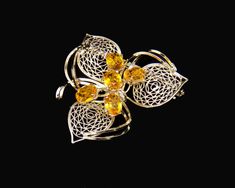 Thank you for visiting the SoChicFinds store - vintage and antique, costume and fine jewelry.  Ornate filigree leaves brooch with orange gemstone.  Gemstones: 5 doublets of citrine,   Metal: rhodium plated brass. Floral vintage jewelry. Citrine brooch has excellent condition. Original box. Japonese vintage Jevelry. 5 Citrine Filigree Leaves Brooch, Orange Gemstone Brooch Pin, Rhodium Plated  Vintage Floral Costume Jewelry Floral Costume, Gemstone Brooch, Floral Pins, Carved Shell, Sterling Silver Chain Necklace, Enamel Brooch, Silver Brooch, Blue Chalcedony, Floral Vintage