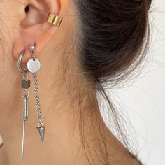 Add a touch of urban sophistication to your jewelry collection with these edgy stainless steel dangles. Perfect for those who love a mismatched look, these earrings are a unique way to express your individual style. The sleek stainless steel design adds a contemporary edge, making them perfect for any outfit or occasion. Whether you're dressing up for a night out or adding a cool touch to your everyday look, these dangles are sure to make a statement. A must-have for anyone who loves to stay ahe Urban Sophistication, Titanium Jewelry, Nose Rings Hoop, Mismatched Earrings, Hypoallergenic Earrings, Steel Design, Urban Style, Clothing Inspiration, Style Earrings