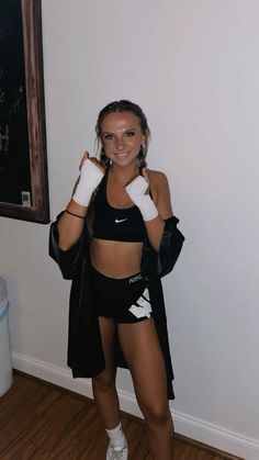 Difficulty: Easy     Supplies:  • Black robe  • Sports bra  • Spandex  • Athletic tape Boxer Halloween Costume Couple, Sports Costume Ideas, Easy Halloween Costumes For Women, Cute Couples Costumes, Halloween Costumes College Girls