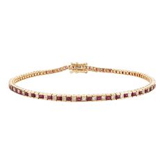 This is part of Chairish’s Fine Jewelry assortment.  This Ruby and Diamond Sleek Tennis Bracelet in 18K gold showcases 1.7 carats endlessly sparkling natural ruby and 1.26 carats of diamonds. It measures 7.5 inches long in length.  Ruby improves mental strength.  Designed with perfect square cut ruby alternatingly set with a diamond to make you stand out on any occasion or event. The elegant style complements the attire beautifully and is a perfect Engagement Gift, Bridal Shower Gift, Gift For L Classic Ruby Gemstone Tennis Bracelet, Classic Ruby Tennis Bracelet For Anniversary, Elegant Ruby Tennis Bracelet In Yellow Gold, Elegant Yellow Gold Ruby Tennis Bracelet, Ruby Tennis Bracelet In Yellow Gold For Anniversary, Yellow Gold Ruby Tennis Bracelet For Anniversary, Anniversary Ruby Tennis Bracelet In Yellow Gold, Classic Ruby Tennis Bracelet With Jubilee Design, Classic Ruby Tennis Bracelet For Formal Occasions