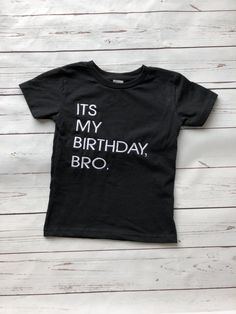 It's My Birthday, Bro. Birthday Shirt Black cotton tshirt with white embroidery. The writing is embroidered in house. Sizes: - 12m - 18m - 2T - 3T - 4T - 5T - Youth Small (6T) -Youth Medium (7/8) This item shipped without tracking to save you on shipping. If you would like tracking or faster shipping please select that option. To view even more shirts and products, please visit our facebook page at www.facebook.com/sewingseamswithlove Black Letter Print Shirt For Birthday, Basic Crew Neck T-shirt For Birthday, Birthday Cotton T-shirt With Custom Text, Birthday Crew Neck T-shirt With Embroidered Text, Birthday Embroidered Text T-shirt With Crew Neck, Custom Text Cotton T-shirt For Birthday, Birthday Cotton T-shirt With Funny Text, Custom Text Birthday T-shirt With Short Sleeves, Black Cotton Tops For Birthday