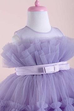 THA Dressing presents the amazing Diana Collection! Mothers and daughters love this magic model that we designed in 8 different colors! Layered tulle is finished with a gorgeous satin belt. Glamorous, fluffy, special and absolutely adorable! Details Fabric: Dream tulle, crystal tulle, cotton lining Light lilac dress Sleeveless dress Light lilac illusion collar The chest is made of multi-layered tulle Light lilac bow belt at the waist Tulle layered ruffle detail crinoline Knee-length skirt Sugges Lilac Party, Silver Flower Girl Dress, Toddler Girl Christmas Dresses, Sequin Dress Outfit, Daughters Love, Girls Gold Dress, Purple Flower Girl Dress, Girl Green Dress, Purple Girls Dress