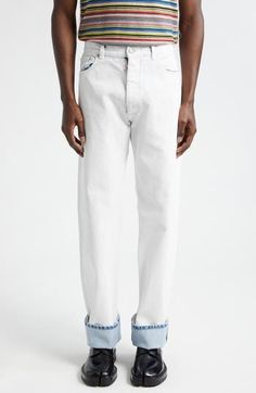 Fashion constantly evolves, and so do these nonstretch-denim jeans that've been painted with a crackled white coating that will intentionally chip with wear. Four white basting stitches at the back add discreet branding. 34 1/2" inseam; 16 1/2" leg opening; 12" front rise; 14 1/2" back rise (size 32) Zip fly with button closure Five-pocket style 100% cotton Hand wash, dry flat Made in Italy Designer Clothing Relaxed Fit White Rigid Denim Bottoms, White Jeans With Five Pockets For Spring, White Five Pocket Jeans For Spring, White Five-pocket Jeans For Spring, White Bottoms With Frayed Straight Hem, White Spring Jeans With Five Pockets, White Washed Cotton Jeans, White Bleached Straight Leg Jeans, White Washed Denim Jeans