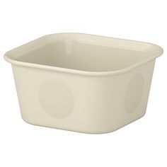 a white plastic container with dots on the lid and bottom, sitting upright against a white background