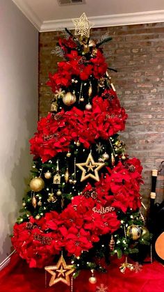 a christmas tree with red and gold decorations