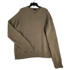 J. CREW Men's Knit Wool V-Neck Sweater 100% lambswool V-neck Measurements: (All measurements are approximate and may vary slightly from the listed information) Armpit to armpit 24" Shoulder + sleeve length 36" Front length 27" (taken from base of neck to hem) To ensure a perfect fit, please compare the measurements above to an item you already own that fits you well Classic Knit V-neck Sweater For Winter, Classic Knitted V-neck Sweater For Fall, Classic Knitted V-neck Sweater For Winter, Casual Long Sleeve Lambswool Sweater, Casual Wool V-neck Sweater For Winter, Classic Brown Crew Neck Polo Sweater, Classic Brown Polo Sweater With Crew Neck, Casual Wool Polo Sweater With V-neck, Casual Wool V-neck Polo Sweater