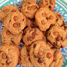 a plate full of chocolate chip cookies on a table