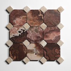 several different types of marble tiles on a white surface with brown and tan colors, arranged in an octagon pattern