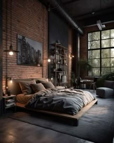 an industrial bedroom with brick walls and flooring is lit up by lights from lamps on either side of the bed