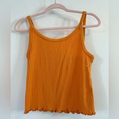 Super Cute, Oh So Soft Ribbed Cropped Cami/Tank Top With Spaghetti Straps. Size Medium. Color Is Called Wild Papaya, It Is Almost Pumpkin Orange, But A Bit Lighter. More Orange Than A Mustard Yellow. Would Make A Great Year Round Staple Piece, Or Pajama/Lounge Top! Brand New Condition, However The Tag Is Missing. Ribbed Summer Camisole, Spring Ribbed Cami Camisole, Spring Ribbed Tank Top With Spaghetti Straps, Casual Ribbed Crop Top With Spaghetti Straps, Summer Ribbed Spaghetti Strap Tops, Orange Camisole Tank Top For Spring, Yellow Ribbed Stretch Tank Top, Yellow Fitted Tank Top With Straps, Summer Ribbed Tank Top With Spaghetti Straps