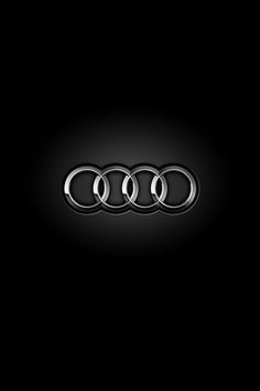 an audi logo is shown in the dark