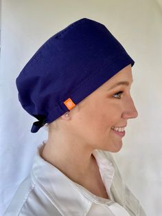 Scrub Hair Caps with adjustable back strap design. Available for all head shapes and hair styles. Ideal for all health care providers: doctors, nurses, dentists, assistants, etc. Made with signature cotton fabric. Soft and comfortable for all day wearing. Care instructions: - Wash with phosphate free detergent. - Warm or cool delicate setting. - Tumble dry or line dry. - Iron on the back of the printed fabric. - Shrinkage may occur during washing. Dental Caps, Hair Caps, Dental Scrubs, Navy Blue Scrubs, Handmade Scrub, Blue Scrubs, Dental Hygienist, Surgical Caps, Scrub Hat