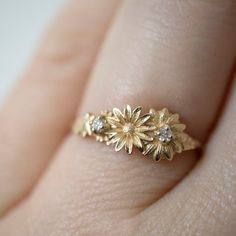 Floral Stacking dainty daisy flower ring for women with | Etsy Dainty Flower Ring With Rose Cut Diamonds As Gift, Dainty Yellow Gold Cluster Ring, Flower Shape Stackable Rings For Anniversary, Delicate Tiny Flower Promise Ring, Dainty Cluster Promise Ring, Dainty Flower Ring For Anniversary, Tiny Delicate Flower Promise Ring, Dainty Flower Promise Ring, Tiny Flower Shaped Wedding Ring