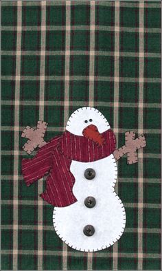 a snowman made out of plaid material