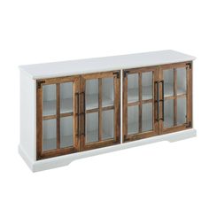 a white and wood cabinet with glass doors