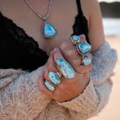 Stunnning Absolutely one of a kind Tribal Style Dominican Larimar, Pectolite or "Dolphin Stone" Ring set in gorgeous 92.5% Sterling Silver Setting.  Size 9 US  Height of face of stone - 48mm Width " " " - 22mm   Larimar is the embodiment of the tranquil Sea and Sky energies. Its soft, soothing blues and calming turquoise is streaked with white patterns that resemble sunlight dancing beneath Caribbean waters. It brings the ancient wisdom of Atlantis and the healing power of dolphins to harmonize