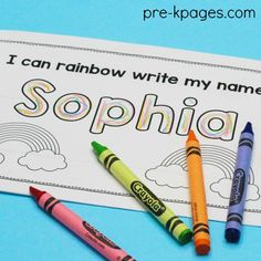 some crayons are laying on top of a paper with the words i can rainbow write my name sophiia