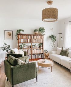 a living room filled with furniture and bookshelves