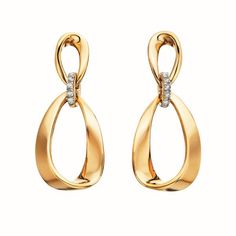 These women's earrings feature yellow gold plated oval links with a diamond connector. The earrings are perfect for adding a touch of elegance to any outfit. Elegant Luxury Oval Pendant Earrings, Luxury Oval Faceted Earrings, Luxury Gold Oval Earrings, Luxury Gold Oval Diamond Earrings, Oval Diamond Earrings With Elegant Design For Formal Occasions, Elegant Oval Diamond Earrings For Formal Occasions, Gold Oval Diamond Earrings With Accents, Modern Gold Teardrop Diamond Earrings, Gold Oval Diamond Earrings