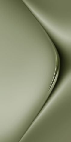 an abstract green background with smooth lines and curves in the center, as seen from above