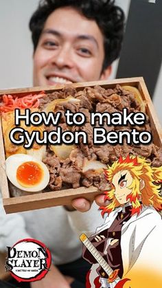 a man holding up a wooden box filled with food and the words how to make gyddon bento