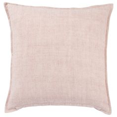 a light pink pillow on a white background