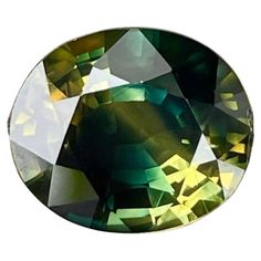 an oval shaped green diamond on a white background