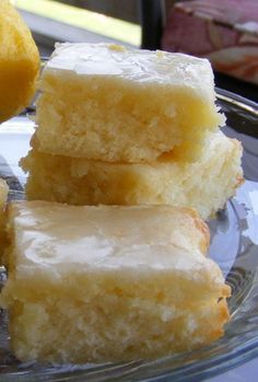 three pieces of cake sitting on top of a glass plate