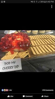 the waffles are topped with strawberries and cheese, along with a sign that says pop my cherry dip