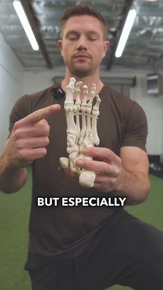 a man is holding a fake skeleton in his hands with the caption, but especially