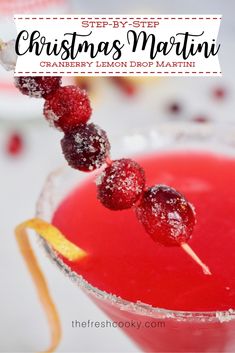 a christmas martini garnished with cranberry lemon drop martini