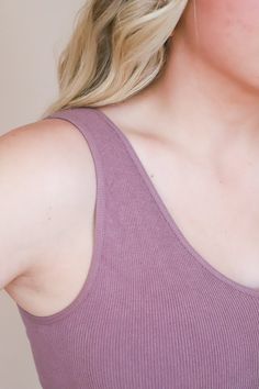 This is called our "Live In Tank" for a veryyy good reason. It is the highest quality seamless ribbed tank top. Beyond stretchy and so comfortable. You will want to wear it everyday of your life! (Not to be dramatic, but it's true). Running true to size. Cropped. Miranda is 5'4" and wearing a size S/M 72% Modal, 24% Nylon, 4% Spandex Trendy Seamless Tank Top For Everyday, Casual Seamless Tank Top For Loungewear, Everyday Trendy Seamless Tank Top, Basic Ribbed Tank Top For Loungewear, Casual Seamless Tank Top, Trendy Ribbed Tank Top For Everyday, Trendy Everyday Ribbed Tank Top, Seamless Sleeveless Tank Top For Loungewear, Trendy Sleeveless Seamless Tank Top