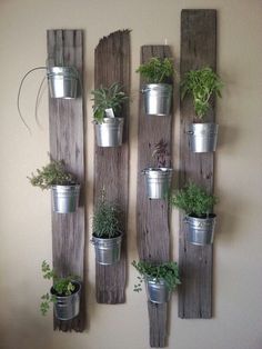 the vertical pot holder from pallet planks is made out of old wooden boards