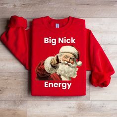 "Unleash the holiday spirit with our \"Big Nick Energy Sweatshirt,\" a hilarious and festive addition to your Christmas wardrobe. This unique piece combines the joy of the season with a dash of humor, making it the perfect choice for a Very Merry Christmas Party or any festive occasion. 🌟 Crafted with Care: This design is created using DTF technology, ensuring every image boasts a pristine 300+ dpi resolution for stunning quality. 📏 Perfect Fit & Style: Refer to our size and type charts to find the ideal fit for your chosen product. 👕 Quality Assured: Sweatshirts and hoodies are made with Gildan, while other items feature Bella + Canvas--rest assured, all products are subject to availability at the time of your order. 🎨 Color Selection: We offer a curated selection of colors available Cricut Christmas Shirts Dirty, Big Nick Energy, Type Chart, Christmas Wardrobe, Funny Holiday Shirts, Christmas Party Shirt, Very Merry Christmas Party, Christmas Party Shirts, Santa Shirt