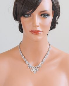 "Dramatic wedding necklace features floral and leafy cluster as the focal point. Exquisitely created with graduated marquise cut cubic zirconia mounted in a metal setting to create a feminine vintage glamour look. Delicately finished off with an adjustable extender at the end. Measurements: Necklace length (crystal decorative portion) measures approx. 16\" with an extender. ❥ Necklace can be customized as follows: (1) Finish: SILVER (rhodium) or ROSE GOLD tone. (2) Extender Chain Length: 2, 3 or Marquise Cut Crystal Jewelry For Wedding, Elegant Marquise Cut Wedding Necklace, White Marquise Necklace For Wedding, Gold Necklace Wedding, Glamour Vintage, Necklace Quotes, Back Necklace, Wedding Bridal Jewellery, Rose Gold Wedding