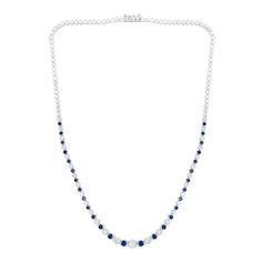 This blue lab-created sapphire and diamond tennis necklace radiates alluring beauty and classic style. 10K white gold Alternating diamonds and blue lab-created sapphires graduate in size to the largest 1/5 ct. diamond at the center 1-1/2 cts. t.w. of diamonds 16.0-inch necklace; box clasp Classic Blue Diamond Necklace With 17 Jewels, Classic Blue Diamond Necklace With Diamond Cut, Classic Blue Diamond Cut Diamond Necklace, Elegant Round Gemstone Tennis Necklace, Classic Blue Diamond Cut Necklace, Elegant Gemstone Tennis Necklace, Classic Sapphire Diamond Necklace For Formal Occasions, Classic Sapphire Necklace For Formal Occasions, Classic Formal Sapphire Diamond Necklace