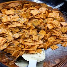 some kind of food that is in a pan on the stove top and ready to be cooked