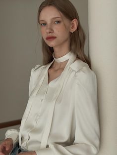 This is a feminine and modern blouse by JOORTI that is made out of high quality and sturdy material. With distinctive mood of the design and comfortable wear, you can style it for your clean and stylish daily outfit.- Wide shoulder panel- V neckline and pin tuck detail- Tie for various styling Elegant Solid Color Tie Neck Tops, Elegant Beige Blouse For Work, Elegant Beige Office Blouse, Chic Beige Formal Blouse, Elegant Beige Blouse For Office, Chic Formal Beige Blouse, White Tie Neck Blouse For Office, Beige Office Lady Tops, Elegant Tie Neck Blouse For Daywear