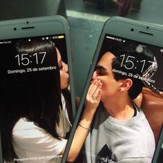 two cell phones with the caption'this is true love'and an image of a couple kissing each other